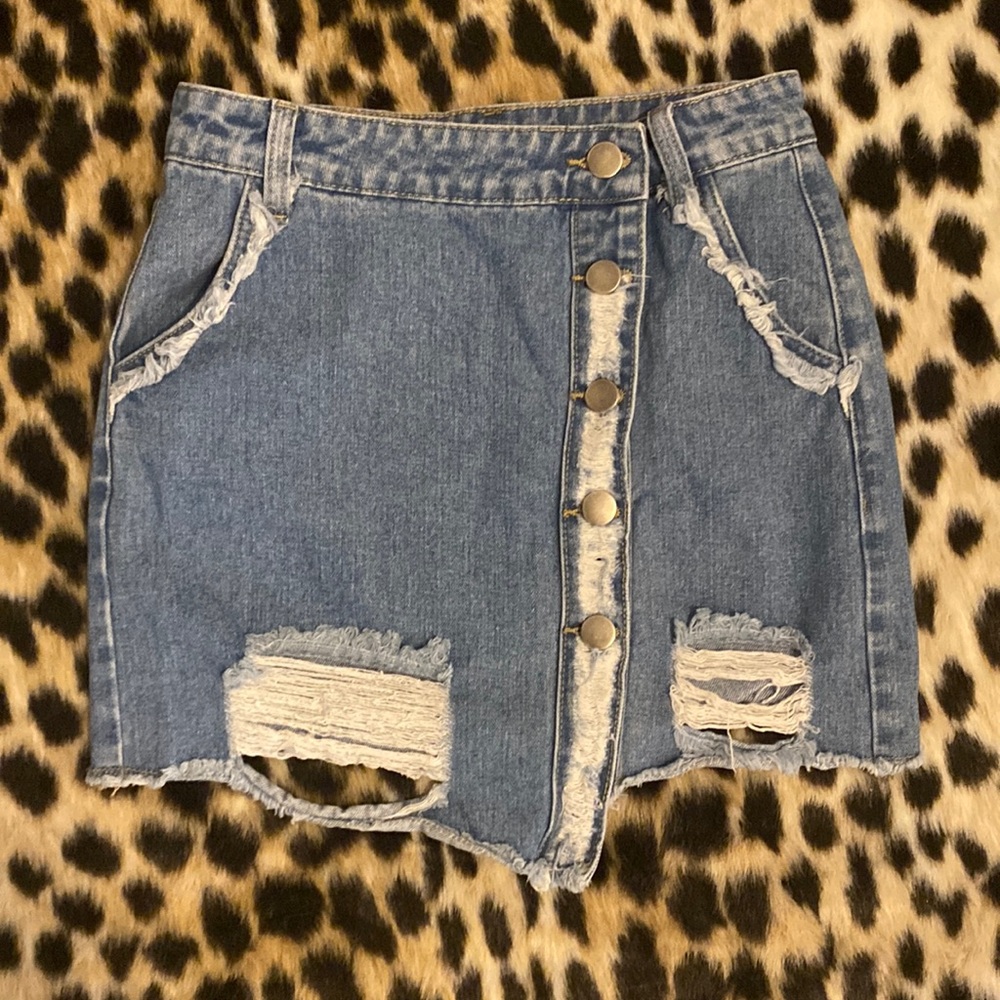 Asymmetrical distressed Blue Jean skirt